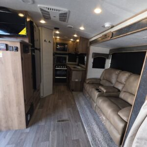Cozy RV living area with comfortable seating.