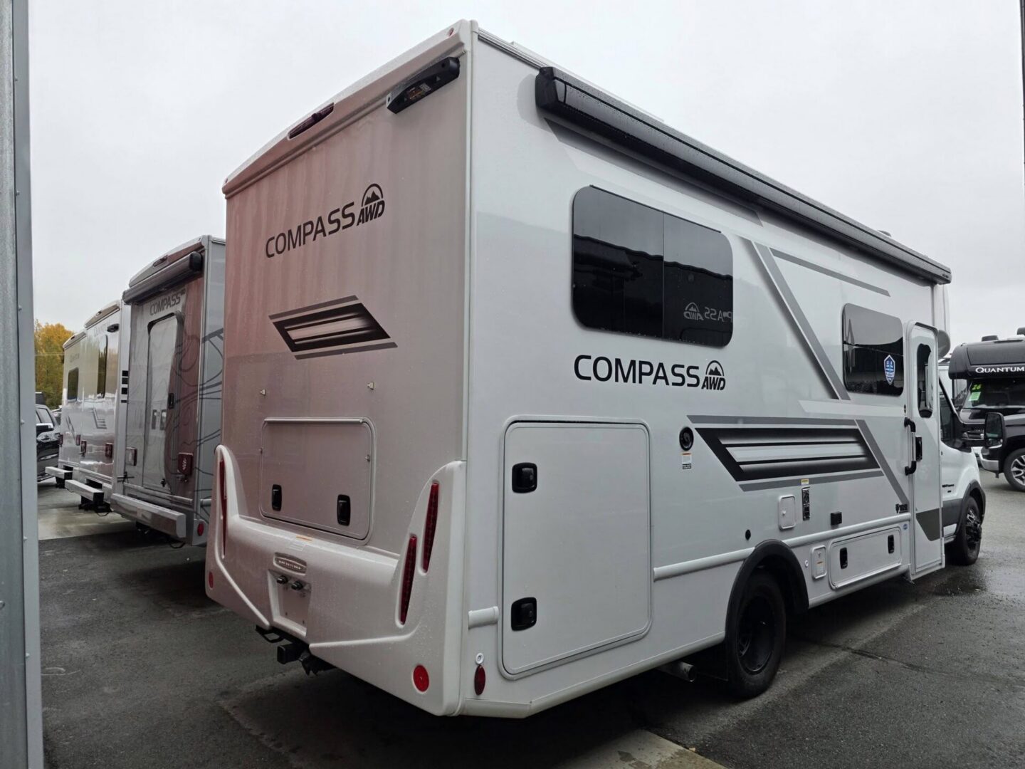 "Rear view of a Compass AWD travel trailer."