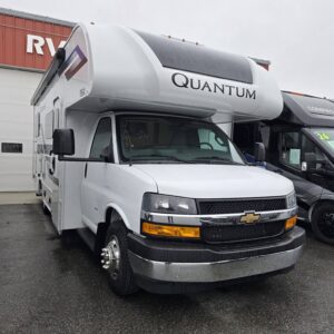 "Chevrolet Quantum RV parked at dealership."