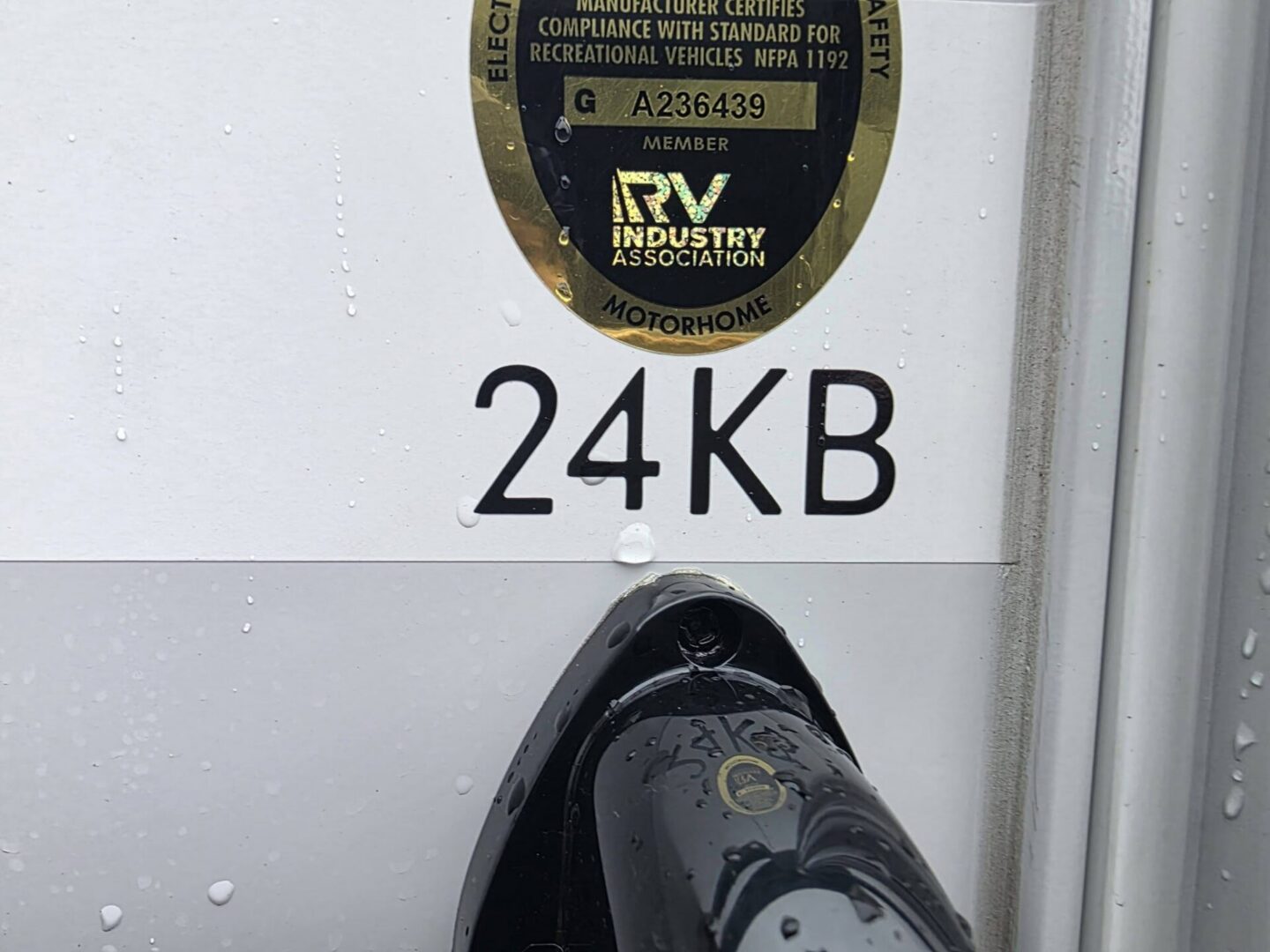 "Close-up of travel trailer identification label."