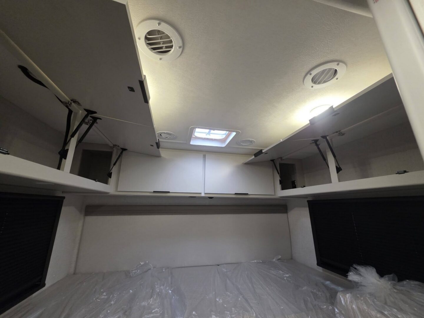 Interior storage compartments in a camper.