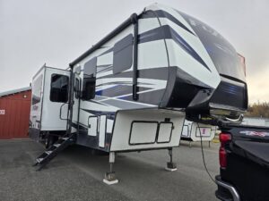 Fuzion travel trailer with unique exterior design.